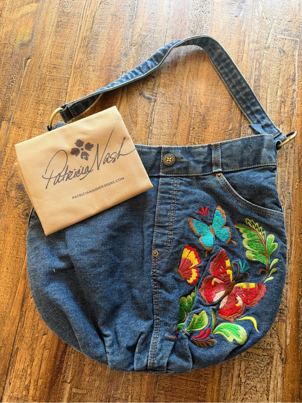NWT Patricia Nash denim hobo bag with embroidered butterflies pockets stylish